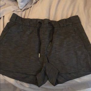 Charcoal grey lululemon shorts with 4” inseam
